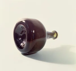 Wine bottle (on side to show kick-up), early 18th century