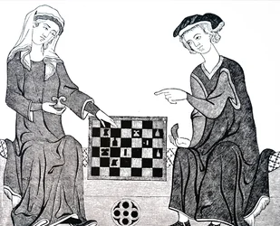 A Man and Woman Playing Chess