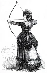 A young lady practicing her archery skills
