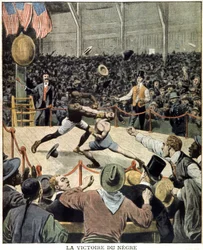 Boxer Jack Johnson wins the world title