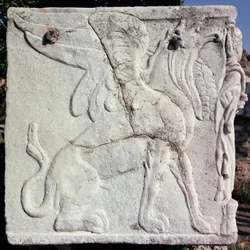 Funeral urn with carved relief of a Griffin