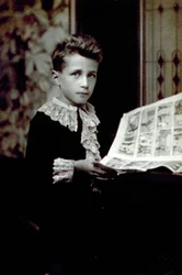 Half-Length Portrait of a Boy Leafing Through a Comic Book