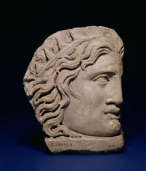 Mask of Helios, Corner Mask from a Sarcophagus Lid, Roman, 4th Century