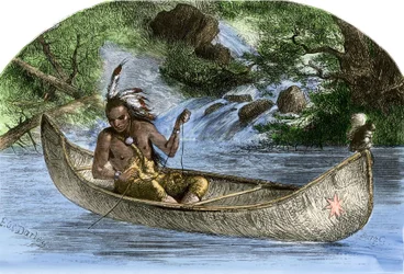 Native population of America: Hiawatha fishing in a canoe