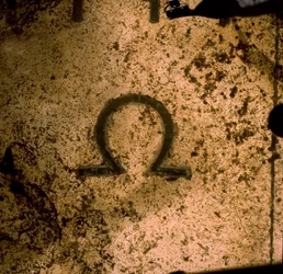 Omega symbol on the Augustus Sundial