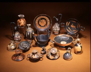 Pottery Group Showing an Etruscan Bucchero Ware Kantharos and a Gnathia Ware Guttus, Centre, Both 6th Century BC