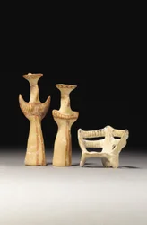 Psi type female idol, Tau type female idol, and model of a throne, 1400-1200 BC