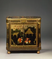 Regency tole peinte black-japanned side cabinet, with front doors painted with figures of merchants in a landscape, rare, c. 1815