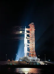 Searchlights illuminate this nighttime scene at Pad A, Launch Complex 39, Kennedy Space Center, Florida, showing the Apollo 17 space vehicle during prelaunch preparations