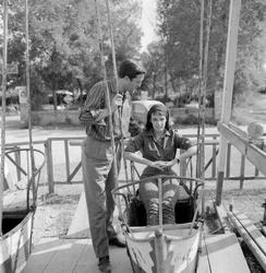 The Actress Marie Laforet with the Director Jean Gabriel Albicocco at Venice Lido - 1961 (on a swing)