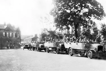 United Kingdom: A Line of Charabancs in the Town Centre, Poynton, Cheshire, c1925