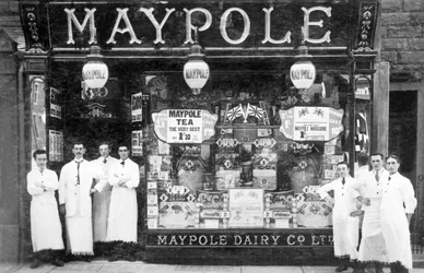 Staff Stand Outside a Maypole Dairy Stores