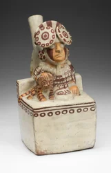 Vessel in the form of a seated ruler with a pampas cat
