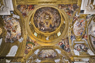 View of the dome, the pendentives, the faults of the transept and the antechoir with frescoes by Baciccia, Church of the Gesù, Rome, Italy