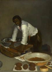 A Man Scraping Chocolate