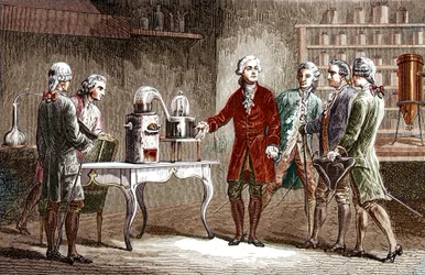 Antoine Laurent Lavoisier (1743-1894) Demonstrating the Decomposition of Air in 1776 - Antoine Laurent Lavoisier, English Chemist, Showing Fellow Scientists His Experiment Which Revealed the Composition of Air in 1776 - Engraving from Louis Figuier
