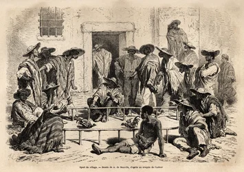 Cockfighting in the village of Marinilla (Magdalena region, Colombia), very popular sport, practiced in a small oblong arena, set up in the center of the courtyard in front of the houses; the roosters are trained to fight until death, and bettors and j