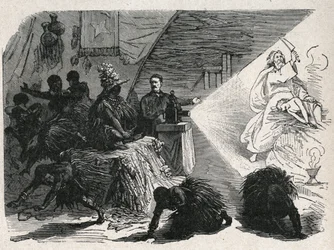 David Livingstone (1813-1873) Scottish missionary and explorer with the magic lantern in the Balonda.