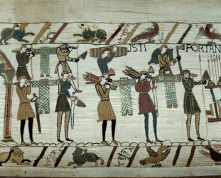 Weapons and wine are brought to the ships during the refuelling for the conquest of England by the fleets of William the Conqueror in 1066 (detail of the Bayeux Tapestry)