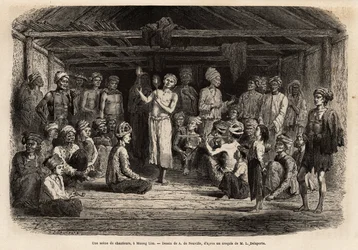 A concert of singers, a Muong Lim (Laos), vivid music and rhythm sung by a soloist and repeated in chorus during each chorus, all wear the traditional hairstyle of the Mou Tsu, who wear long hair, braids under their turban. Engraving to illustrate a voyage