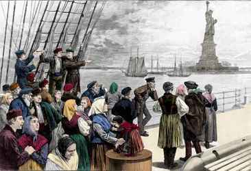 Arriving families of emigrants in the port of New York, the statue of freedom is visible. Engraving from Harper