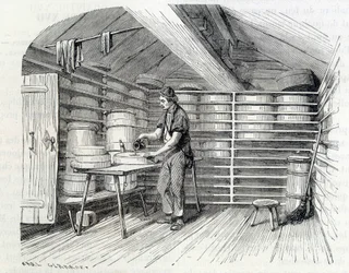 Gruyère cheese shop in a Swiss chalet (washing the crust) - in 
