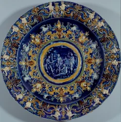 Large polychrome faience dish with a representation of the Judgement of Paris