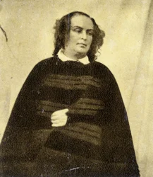 Mrs. Victor Hugo, still dressed in black since the death of her daughter Léopoldine