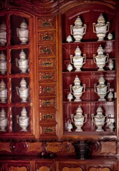 Showcase and Pots of Apothecary in Faience