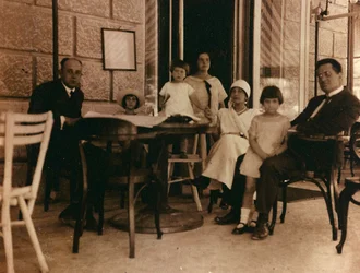 Group of people photographed in a cafe in Pula