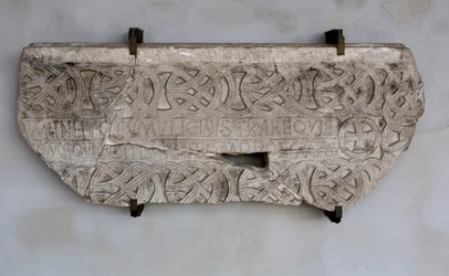 Stone with inscription and decorations