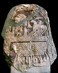 Runestone depicting Wotan (Odin) on his eight-legged horse Sleipnir, boarding a Viking longship