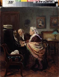 Piano duet. An elderly couple play music while carefully reading their score, with a small white dog beside them