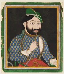 Bearded man wearing a green turban