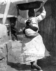 A Korean Woman Carrying a Baby on Her Back