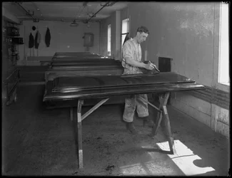 Flowing the tops of wooden caskets, Oneida, New York, April 3, 1916