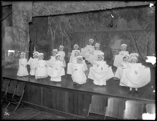 Kindergarteners on Stage: Very Small Girls Perform on a Small Stage, Probably the Roman Catholic Orphan Asylum, Kingsbridge, Bronx
