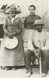 Postcard of Harriet Tubman, Nelson Davis, and daughter Gertie, ca. 1887, printed 1992
