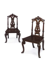 Pair of George II hall chairs, executed by James Moore the Younger, c.1727-31