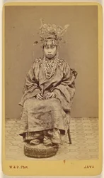 Javanese Woman Wearing an Ornate Headdress, Seated
