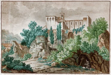 A Monastery in Italy. Pilgrim Worshiping the Cross of Jesus Christ in a Cave