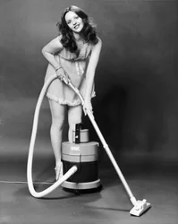 Model with a Vax vacuum cleaner, March 1979