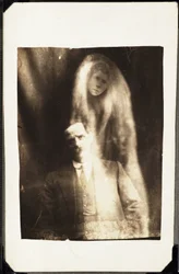 Paranormal Phenomenon: Portrait of a Man and the Spirit of His Wife Appearing Behind Him