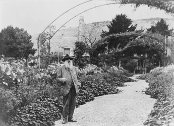 Claude Monet in his garden at Giverny, 1925