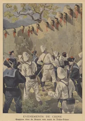 The Boxer Rebellion: the decapitated heads of fourteen Boxers displayed on the walls of Tchio-Tchao